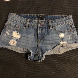 Distressed denim shorts